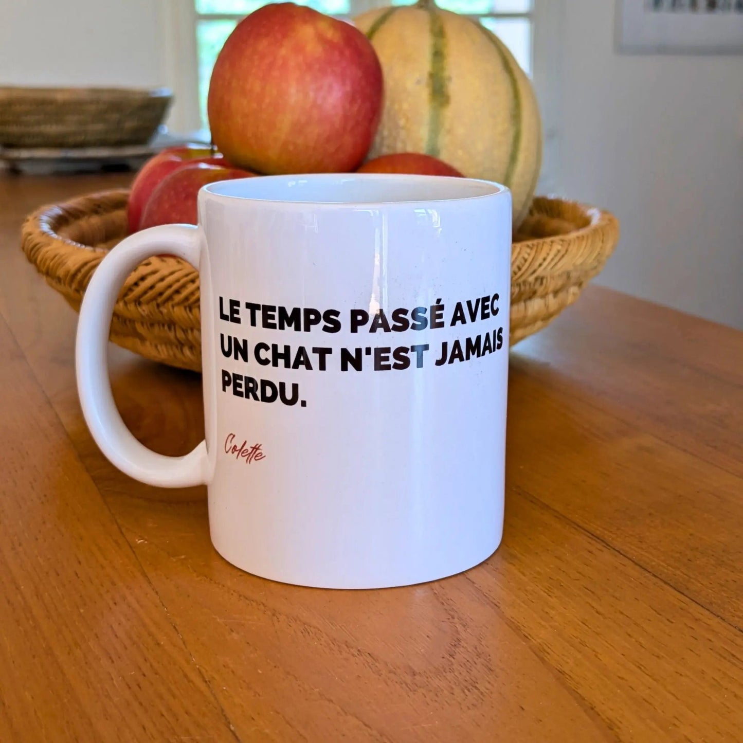 Mug orné de la citation de Colette "Le temps passé avec un chat n'est jamais perdu"