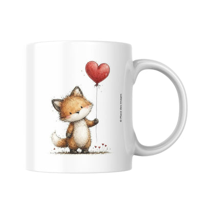 Mug en céramique blanche Saint-Valentin avec illustration d'un petit renard tenant un ballon cœur rouge
